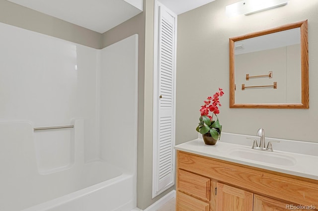 7466 E Long Cir, Centennial, CO 80112 - bathroom featuring vanity and a closet