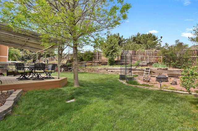 7466 E Long Cir, Centennial, CO 80112 - view of yard featuring a deck and outdoor dining area