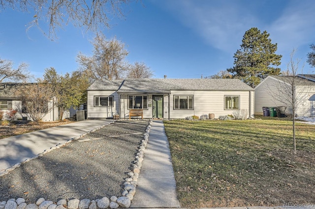 ranch-style house with a front yard