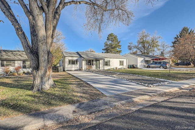 ranch-style house with a front yard