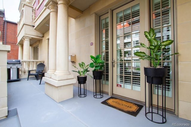 1950 N Logan St Unit 102, Denver, CO 80203 - view of exterior entry with a porch