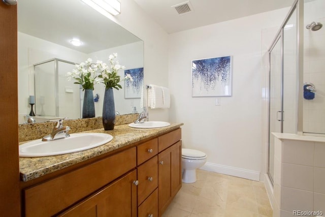1950 N Logan St Unit 102, Denver, CO 80203 - bathroom with double vanity and a stall shower