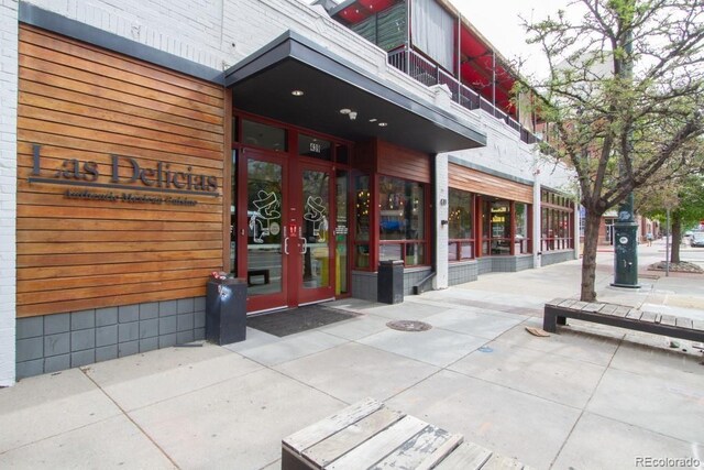 1950 N Logan St Unit 102, Denver, CO 80203 - entrance to property featuring french doors and a balcony
