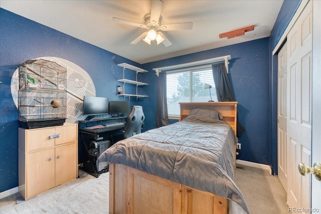 10191 Sagecrest St, Highlands Ranch, CO 80126 - bedroom with light carpet, baseboards, and a ceiling fan