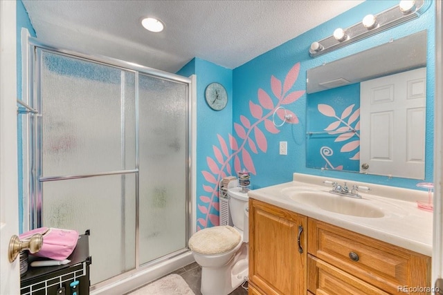 10191 Sagecrest St, Highlands Ranch, CO 80126 - full bath with toilet, vanity, a stall shower, a textured ceiling, and tile patterned flooring