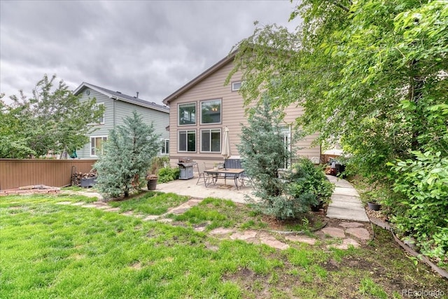 10191 Sagecrest St, Highlands Ranch, CO 80126 - rear view of house featuring a patio area