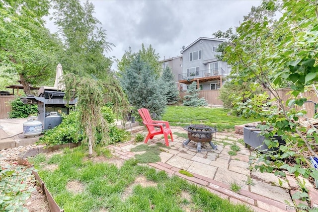 10191 Sagecrest St, Highlands Ranch, CO 80126 - view of yard featuring an outdoor fire pit and a patio