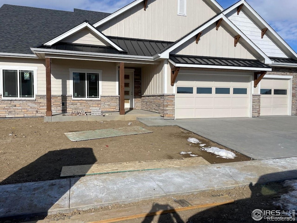 craftsman-style home with a garage