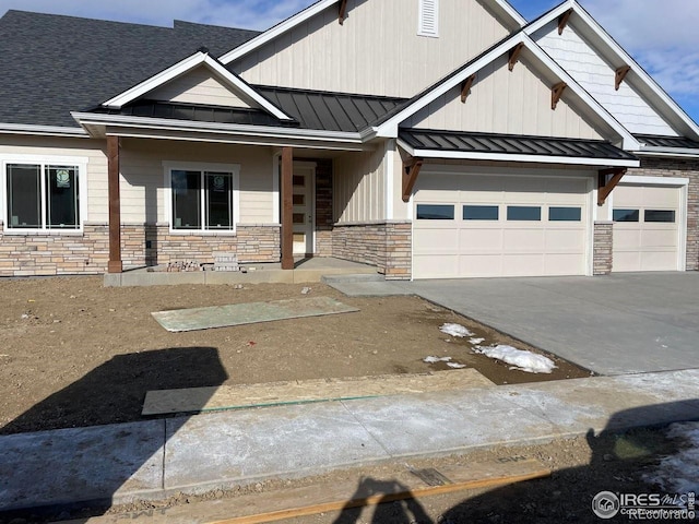 craftsman-style home with a garage