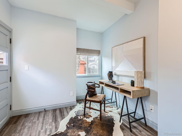 home office with baseboards and wood finished floors