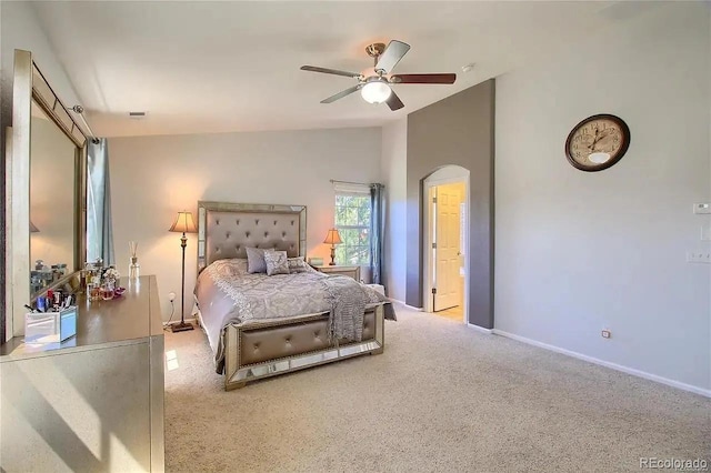 16893 Trail View Cir, Parker, CO 80134 - carpeted bedroom with arched walkways, lofted ceiling, baseboards, and ceiling fan