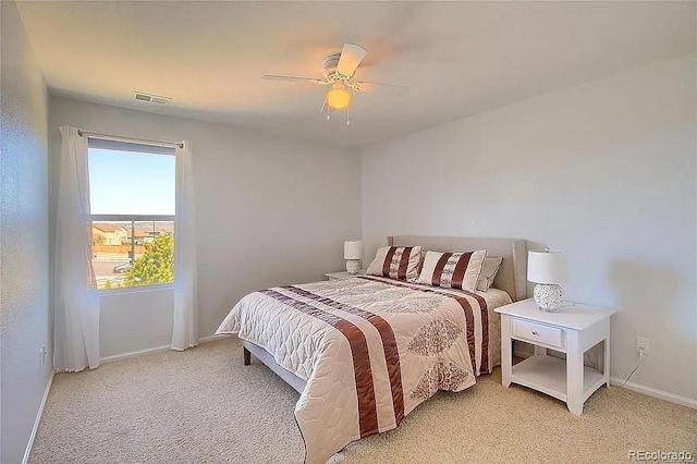 16893 Trail View Cir, Parker, CO 80134 - bedroom featuring light carpet, baseboards, and a ceiling fan