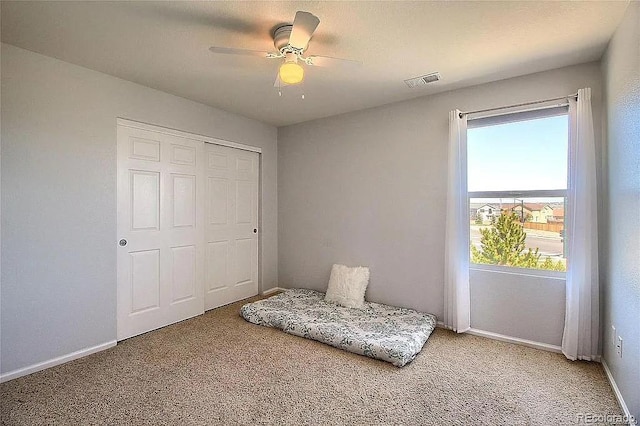16893 Trail View Cir, Parker, CO 80134 - living area with light colored carpet, baseboards, and ceiling fan