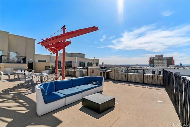 view of patio featuring outdoor lounge area and a grill