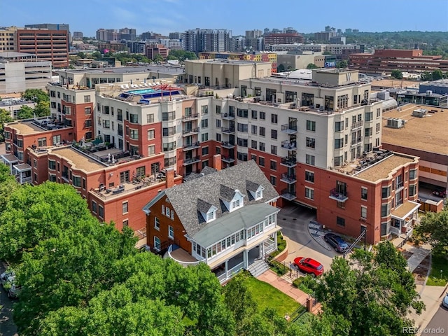 birds eye view of property featuring a city view