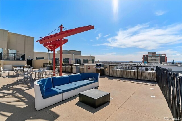 410 Acoma St Unit 518, Denver, CO 80204 - view of patio with an outdoor hangout area and a grill