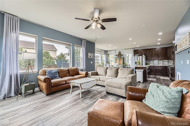 3944 Trail Stone Cir, Castle Rock, CO 80108 - living room featuring ceiling fan, light wood-style floors, and recessed lighting