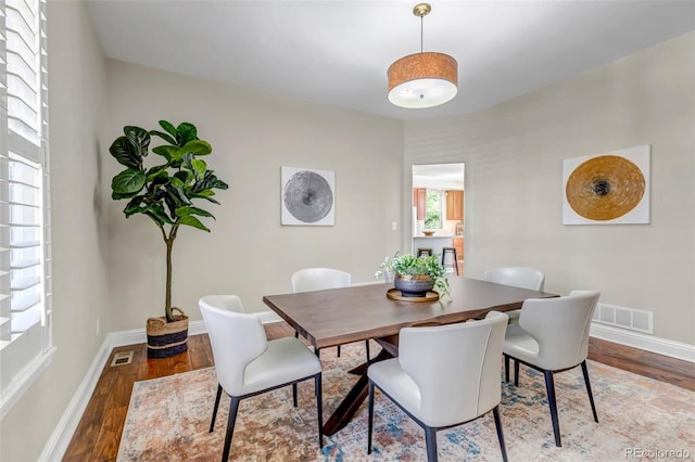 10646 Amesbury Way, Highlands Ranch, CO 80126 - dining room with wood finished floors and baseboards