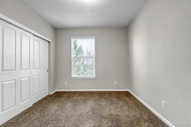 10646 Amesbury Way, Highlands Ranch, CO 80126 - unfurnished bedroom with carpet floors and a closet