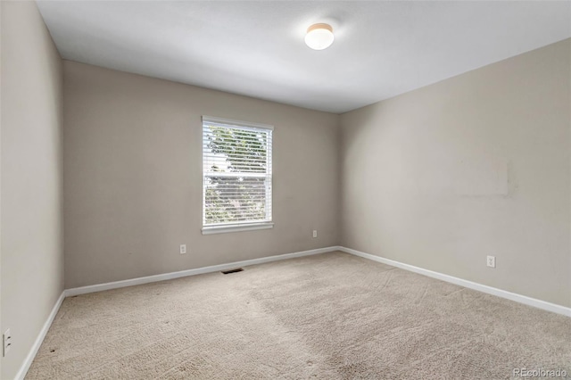 10646 Amesbury Way, Highlands Ranch, CO 80126 - spare room featuring carpet and baseboards