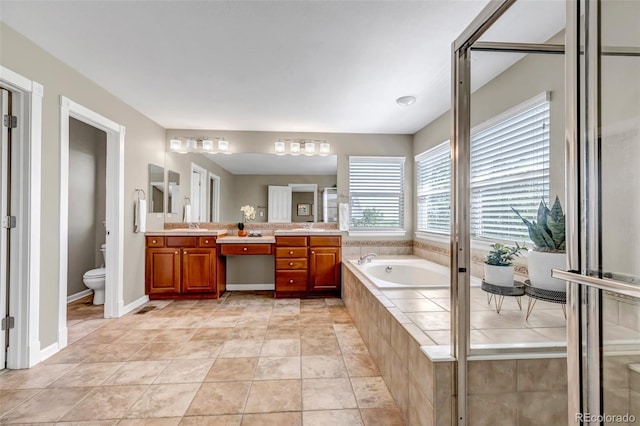 10646 Amesbury Way, Highlands Ranch, CO 80126 - bathroom with double vanity and a garden tub