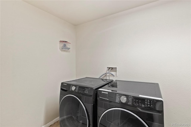 laundry area featuring separate washer and dryer