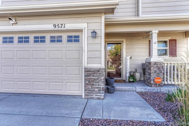 entrance to property featuring a garage