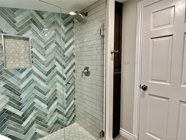 bathroom with a stall shower