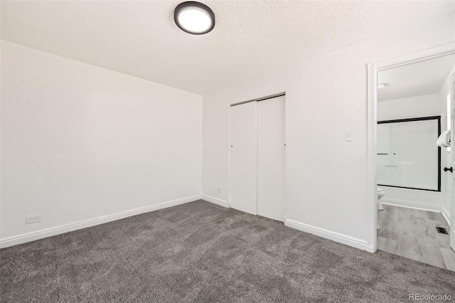 1537 Xenia St, Denver, CO 80220 - unfurnished bedroom with baseboards, carpet flooring, and a closet