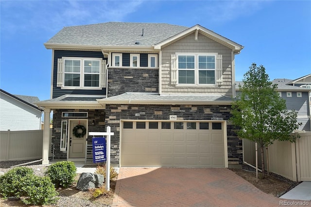 view of front of home with a garage