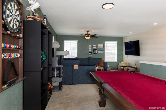 game room with a wealth of natural light, ceiling fan, carpet floors, and billiards