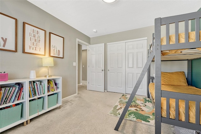 carpeted bedroom with a closet