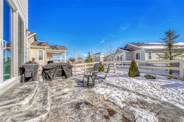 view of snow covered patio