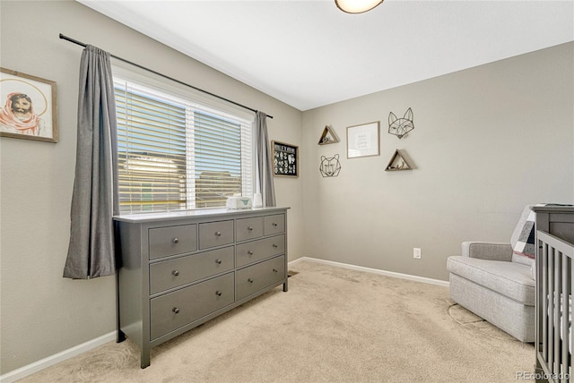 living area with light colored carpet