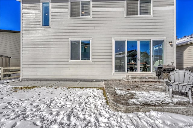 view of snow covered property