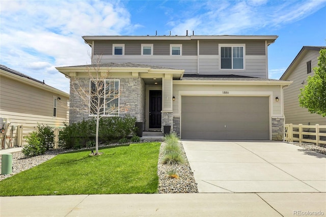 1886 Makley Loop, Castle Rock, CO 80104 - view of front of house featuring concrete driveway, stone siding, and a garage