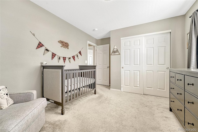 1886 Makley Loop, Castle Rock, CO 80104 - bedroom featuring light colored carpet, a closet, and baseboards