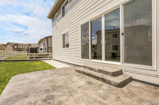 1886 Makley Loop, Castle Rock, CO 80104 - view of side of property with a patio area, entry steps, and a residential view