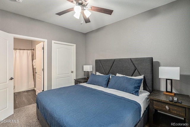 carpeted bedroom featuring a ceiling fan