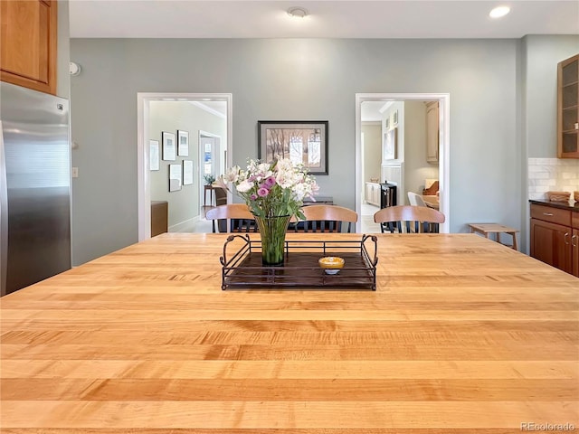 dining space featuring recessed lighting