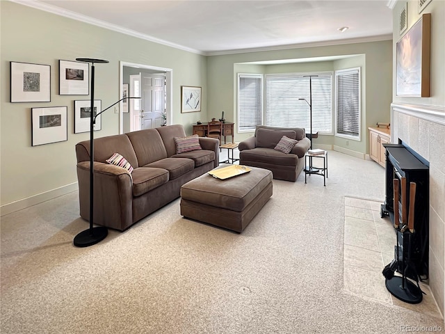 living room with visible vents, baseboards, ornamental molding, and a tile fireplace