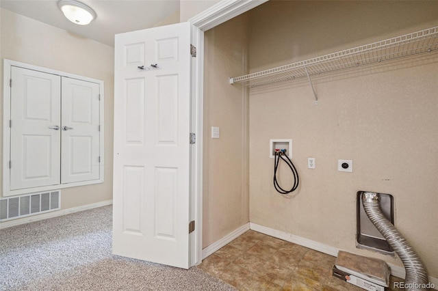 clothes washing area with baseboards, hookup for a washing machine, visible vents, and hookup for an electric dryer