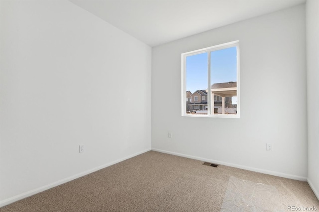 view of carpeted spare room