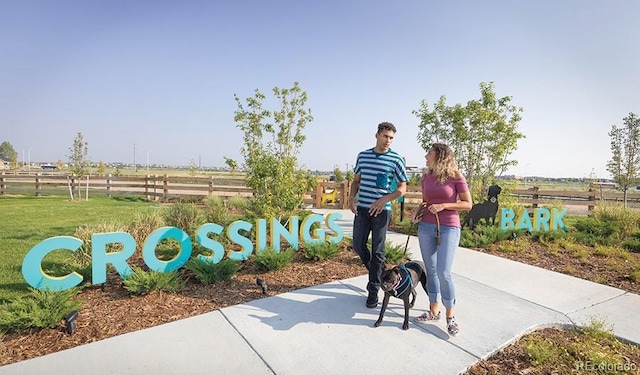 surrounding community featuring a rural view and a yard