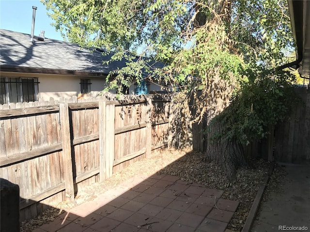 1143 Akron St, Aurora, CO 80010 - view of patio / terrace featuring fence