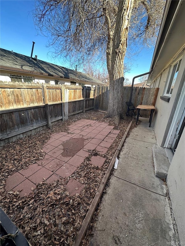 1143 Akron St, Aurora, CO 80010 - view of patio / terrace featuring a fenced backyard