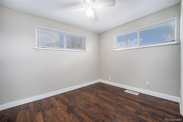1143 Akron St, Aurora, CO 80010 - empty room featuring baseboards, dark wood-type flooring, and ceiling fan