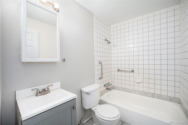 1143 Akron St, Aurora, CO 80010 - bathroom featuring toilet, vanity, and  shower combination
