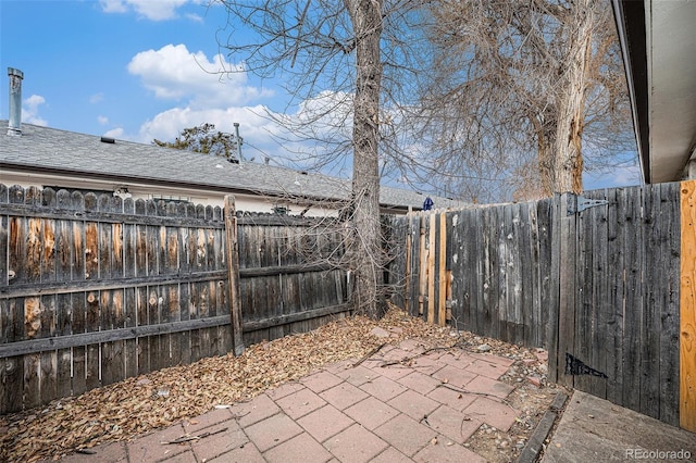 1143 Akron St, Aurora, CO 80010 - view of patio / terrace with a fenced backyard