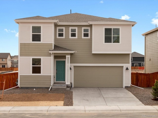 view of front facade featuring an attached garage, a shingled roof, driveway, and fence